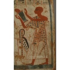 Wooden stela showing priest Padiamun wearing a leopard skin